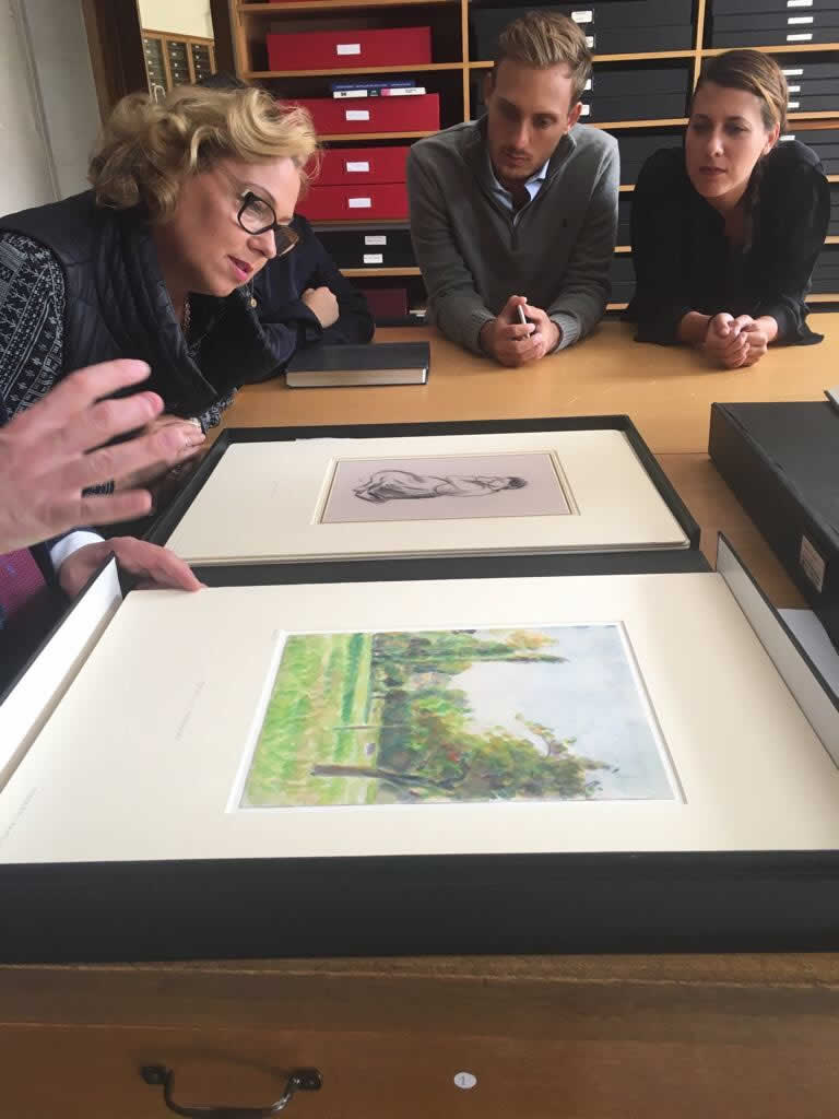 Lélia Pissarro accompanied by 5th generation descendants of the family in the Pissarro Archive at the Ashmolean Museum, Oxford